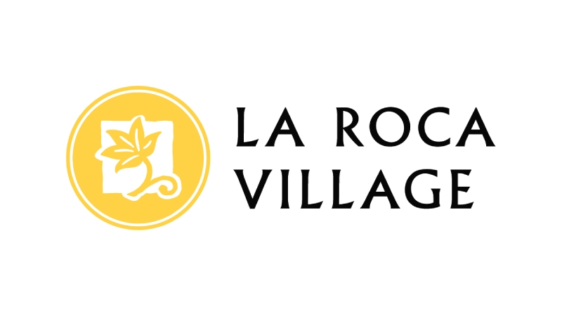 A logo of La Roca Village, Spain